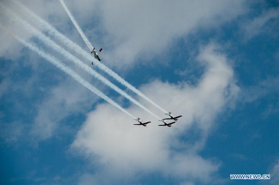 Israeli aircrafts perform aerobatic flights above the Mediterranean Sea near Tel Aviv during a celebration for Israel's Independence Day, April 16, 2013. Beginning at sundown Monday and ending at sundown on Tuesday, Israel celebrated its Independence Day marking the country's 65th anniversary. (Xinhua/Han Chong) 