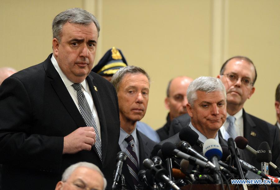 Boston Police Commissioner Edward Davis speaks during a press conference in Boston, the United States, April 16, 2013. The death toll has risen to three, with 176 people injured, 17 of whom in critical conditions. (Xinhua/Wang Lei) 
