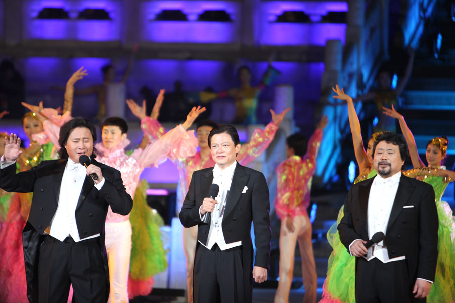 Opera singers Dai Yuqiang, Wei Song and Warren Wah-Yeun Mok perform the festival theme song "I Am In Your World" at the Opening Ceremony of the 3rd Beijing International Film Festival, at the Hall of Prayer for Good Harvests in the Temple of Heaven Park on Tuesday, April 16, 2013. [CRIENGLISH.com, Photo: Zhang Linruo]