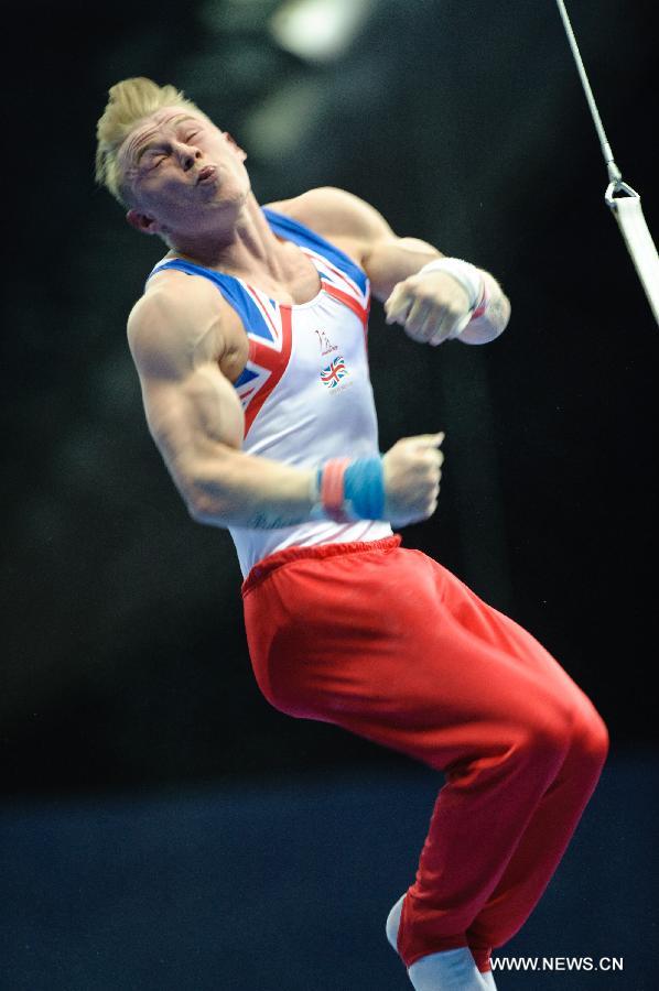 Britain's Theo Seager competes on the rings during the 5th Men's and Women's Artistic Gymnastics Individual European Championships in Moscow, Russia, April 18, 2013. The event kicked off here on Wednesday. (Xinhua/Jiang Kehong)