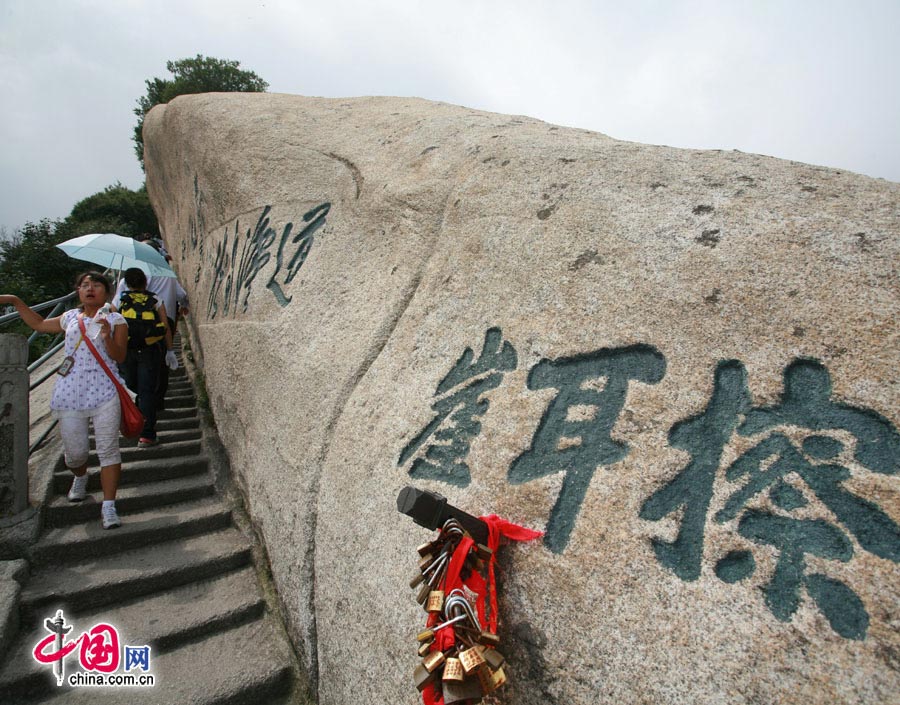 Located in Huayin City, about 120 kilometres east of the city of Xi'an, Mount Hua, one of China's Five Great Mountains, is holy ground for Taoism. It features over 20 Taoist temples, of which the Jade Spring and Zhenyue Palaces are the most famous. It has five peaks, east, west, south, north and central, of which the highest is the South Peak at 2154.9m. Aside from these elements, it is also one of the nine best places to see the sun rise in China. Chaoyang Peak is the best place to watch the sunrise. (China.org.cn)