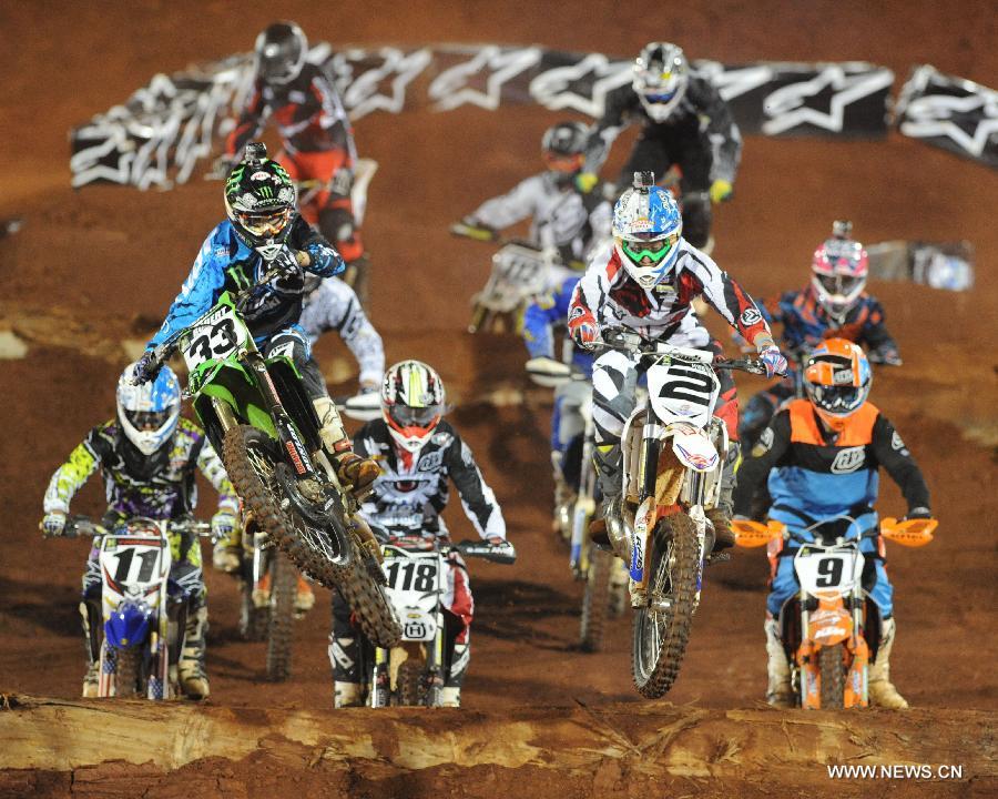 Contestants compete in the Men's Moto Enduro games in Foz do Iguacu, Brazil, March, 18, 2013. The XGames opened here Thursday and will last till Sunday. (Xinhua/Weng Xinyang)