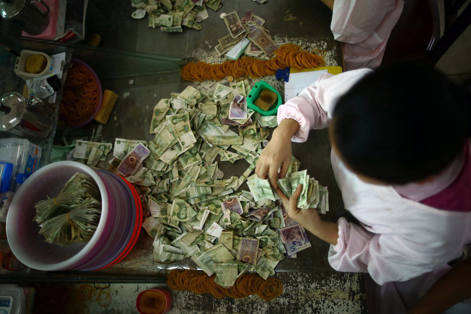 Coin counters: Counting changes and coins of 200,000 yuan every day (5)