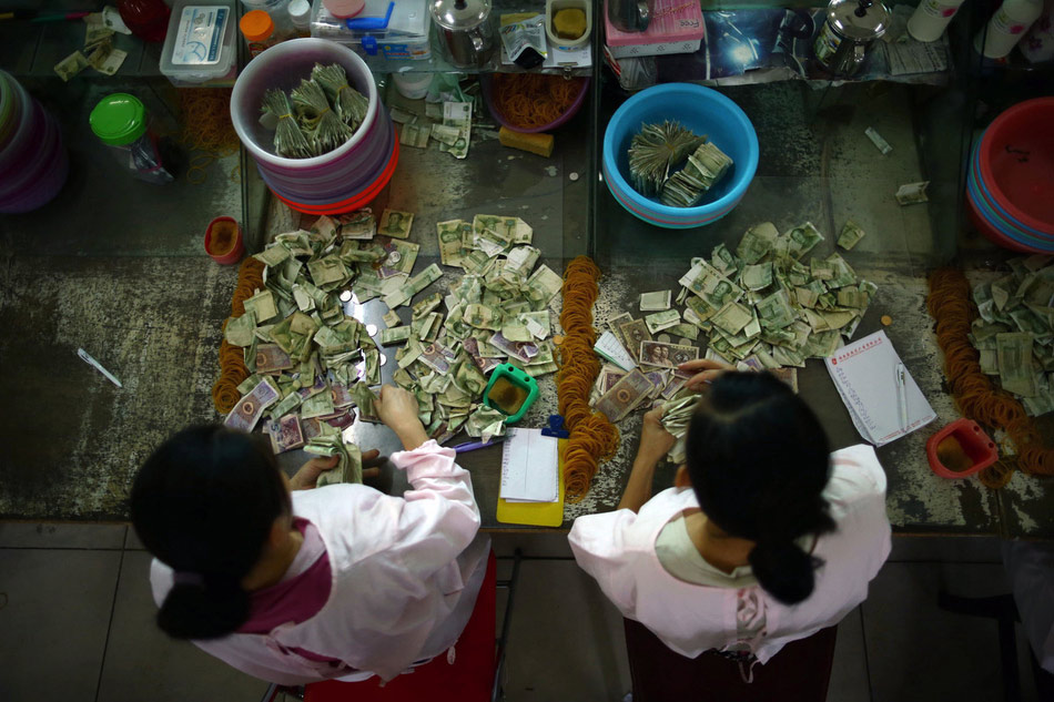 Coin counters: Counting changes and coins of 200,000 yuan every day (7)