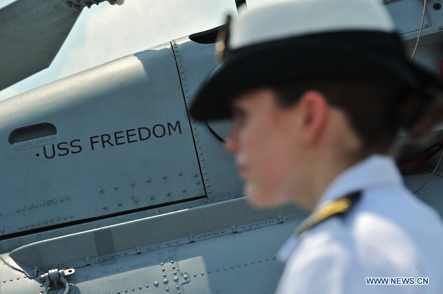 The very first American Littoral Combat Ship (LCS) USS Freedom (LCS 1) arrives in Singapore's Changi Naval Base, on April 18, 2013. The USS Freedom began on Thursday its four-month deployment in Singapore. (Xinhua/Then Chih Wey) 