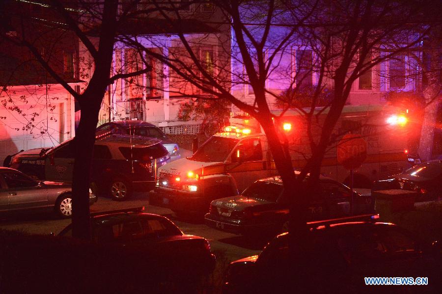 An ambulance leaves the place where a suspect of the Boston bombings was arrested in Watertown of Boston, the United States, April 19, 2013. Suspect of the Boston Marathon bombings, 19-year-old Dzhokhar A. Tsarnaev, was captured on a boat parked on a residential property in Watertown, the state of Massachusetts, on Friday. (Xinhua/Zhang Jun) 