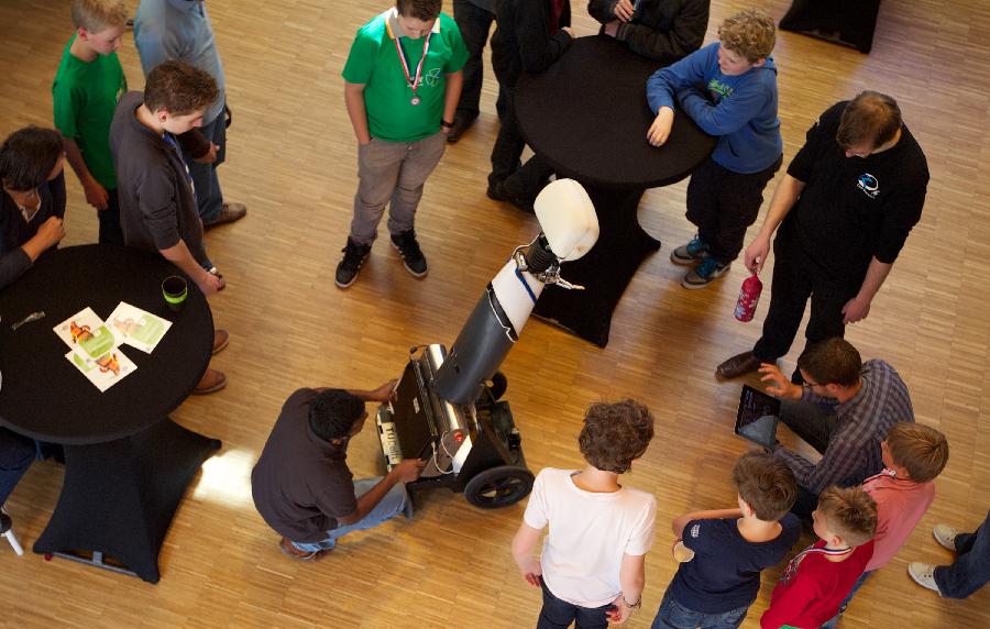 Players show their robots before Dutch national robot cup in Delft, the Netherlands, on April 20, 2013. (Xinhua/Sylvia Lederer) 