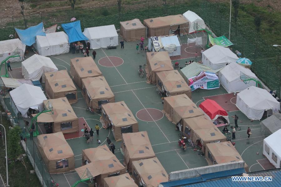 Aerial photo taken on April 21, 2013 shows an evacuation site in a quake-hit area of Ya'an City, in southwest China's Sichuan Province. (Xinhua/Li Gang)