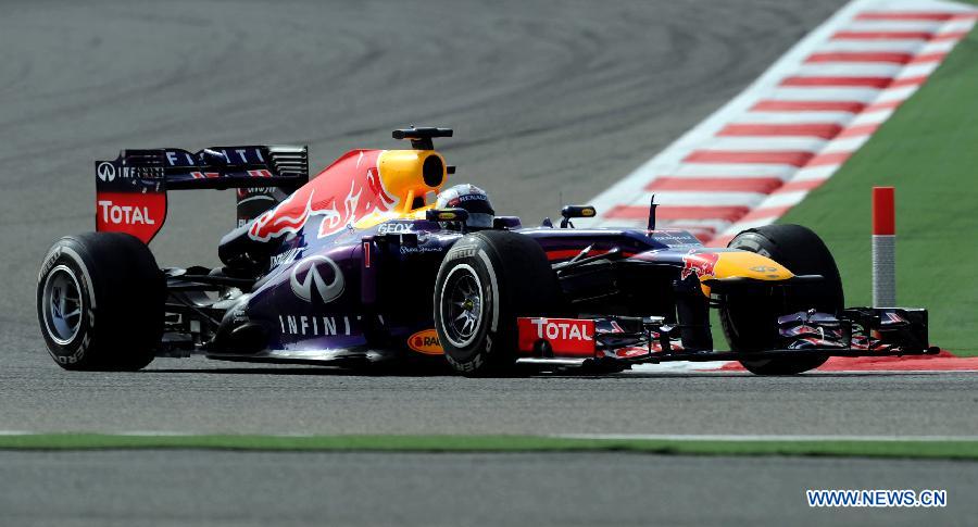 Red Bull driver Sebastian Vettel drives during the Bahrain F1 Grand Prix at the Bahrain International Circuit in Manama, Bahrain, on April 21, 2013. (Xinhua/Chen Shaojin)