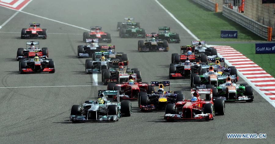 Drivers compete during the Bahrain F1 Grand Prix at the Bahrain International Circuit in Manama, Bahrain, on April 21, 2013. (Xinhua/Chen Shaojin)