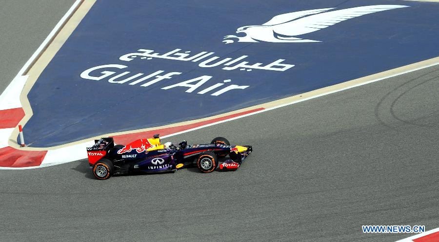 Red Bull driver Sebastian Vettel drives during the Bahrain F1 Grand Prix at the Bahrain International Circuit in Manama, Bahrain, on April 21, 2013. (Xinhua/Chen Shaojin)