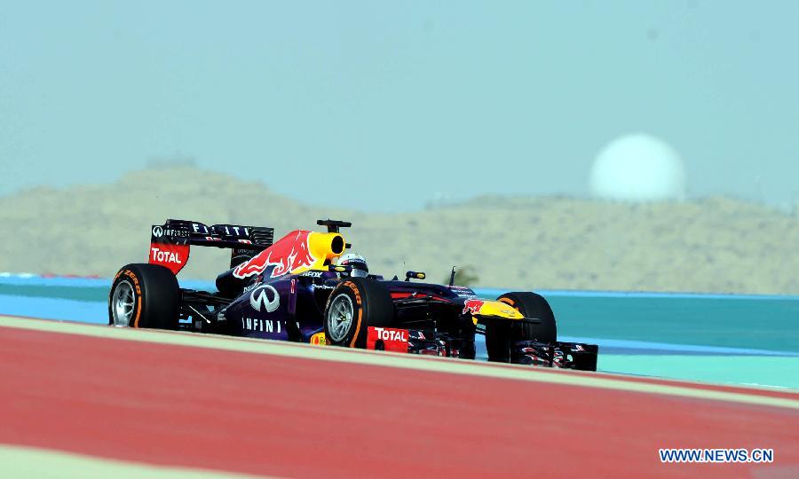 Red Bull driver Sebastian Vettel drives during the Bahrain F1 Grand Prix at the Bahrain International Circuit in Manama, Bahrain, on April 21, 2013. (Xinhua/Chen Shaojin)