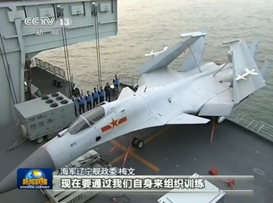 China's aircraft carrier "Liaoning" at Qingdao home base (Photo Source: CNTV.cn)