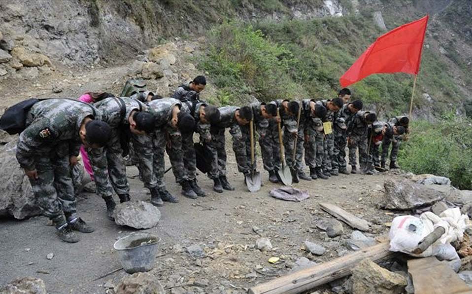 Quake victims desperate for relief goods as rain brings new dangers