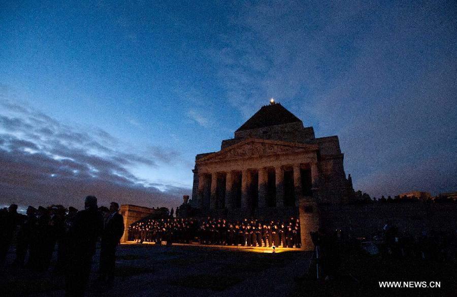 People attend the service marking the Anzac Day at the Shrine of Remembrance in Melbourne, Australia, April 25, 2013. Anzac Day is a national day of remembrance in Australia and New Zealand, originally to honor the members of the Australian and New Zealand Army Corps (ANZAC) who fought at Gallipoli during World War I and now more to commemorate all those who served and died in military operations for their countries. (Xinhua/Bai Xue)