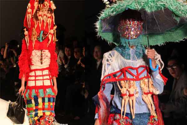 A model presents a creation during the first China Graduate Fashion Week in Beijing, capital of China, April 24, 2013. 610-odd graduate students of fashion from 22 colleges will present their designs during the five-day event. (CNS/Qian Xingqiang)