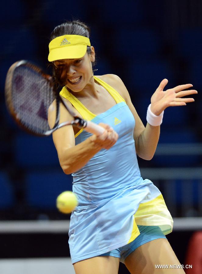 Ana Ivanovic of Serbia returns the ball during the second round match of Porsche Tennis Grand Prix against Nadia Petrova of Russia in Stuttgart, Germany, on April 25, 2013. Ana Ivanovic won 2-0. (Xinhua/Ma Ning)