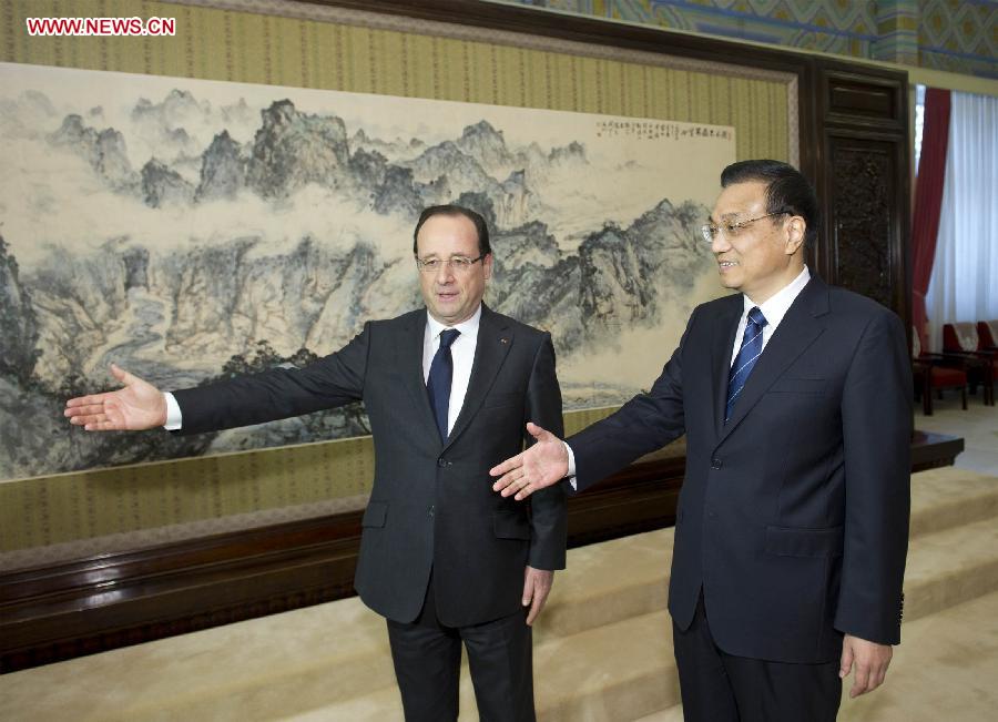 Chinese Premier Li Keqiang (R) meets with French President Francois Hollande in Beijing, capital of China, April 26, 2013. (Xinhua/Huang Jingwen)
