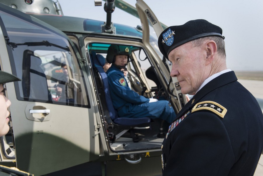 Gen. Martin Dempsey, the visiting chairman of the U.S. Joint Chiefs of Staff, visited the 4th Helicopter Regiment of the army aviation force of the Chinese People's Liberation Army (PLA), watched static display of the Mi-171 and the WZ-9 helicopters and viewed the flight performance of the WZ-10 and the WZ-9 helicopters on the morning of April 24, 2013. Afterwards, Gen. Dempsey successively visited the Army Aviation Force Academy of the PLA and the National Defense University (NDU) of the PLA and held discussions and exchanged views with the teaching and research staff and cadets representatives. (Xinhua)