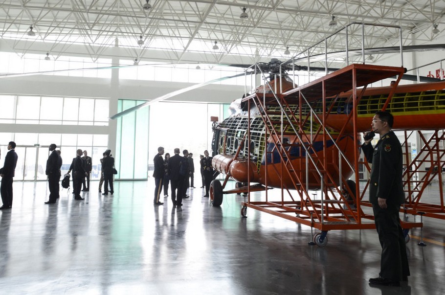 Gen. Martin Dempsey, the visiting chairman of the U.S. Joint Chiefs of Staff, visited the 4th Helicopter Regiment of the army aviation force of the Chinese People's Liberation Army (PLA), watched static display of the Mi-171 and the WZ-9 helicopters and viewed the flight performance of the WZ-10 and the WZ-9 helicopters on the morning of April 24, 2013. Afterwards, Gen. Dempsey successively visited the Army Aviation Force Academy of the PLA and the National Defense University (NDU) of the PLA and held discussions and exchanged views with the teaching and research staff and cadets representatives. (Xinhua)