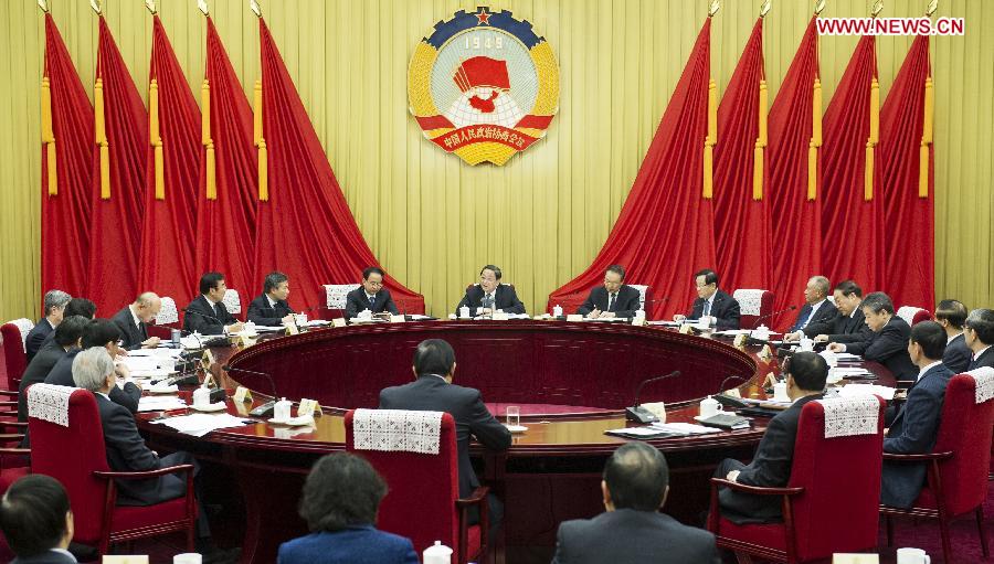 Yu Zhengsheng (C), chairman of the National Committee of the Chinese People's Political Consultative Conference (CPPCC), chairs and addresses the third presidium meeting of the 12th CPPCC National Committee, in Beijing, capital of China, April 26, 2013. (Xinhua/Wang Ye)