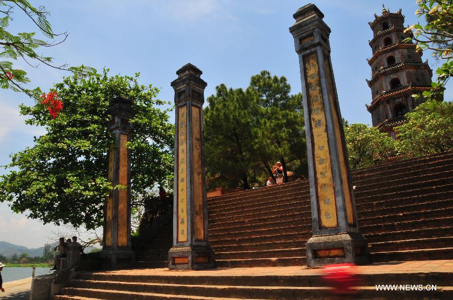 Photo taken on April 28, 2013 shows the tower in Hue, a famous historic and cultural city in central Vietnam. Hue was the capital of Nguyen Dynasty, the country's last feudal dynasty. Hue was recognized by the United Nations Educational, Scientific and Cultural Organization as a World Heritage in 1993. (Xinhua/Zhang Jianhua) 