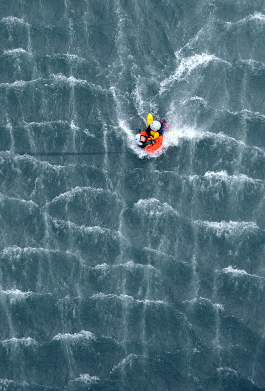 A photo released by Xinhua news agency on April 19, 2013, shows a sailor taking part in a sea rescue exercise conducted by Chinese air force. (Xinhua/Shen Ling)