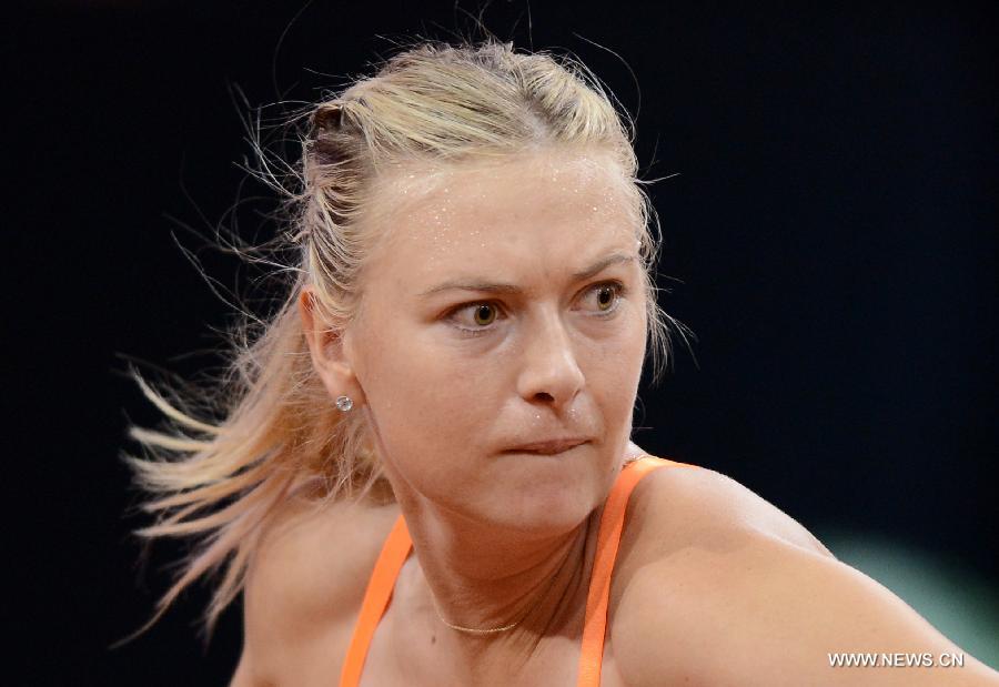 Maria Sharapova of Russia competes during her final match of Porsche Tennis Grand Prix against Li Na of China in Stuttgart, Germany, on April 28, 2013.(Xinhua/Ma Ning)