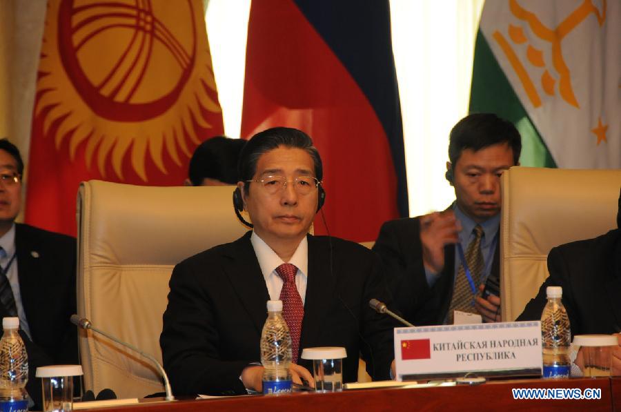 Chinese State Councilor Guo Shengkun attends the secretarial meeting of SCO members' security councils in Bishkek, capital of Kyrgyzstan, on April 29, 2013. The new Chinese leadership will give full support to law enforcement and security cooperation within the framework of the Shanghai Cooperation Organization (SCO), Guo Shengkun said here Monday. (Xinhua/Guan Jianwu)