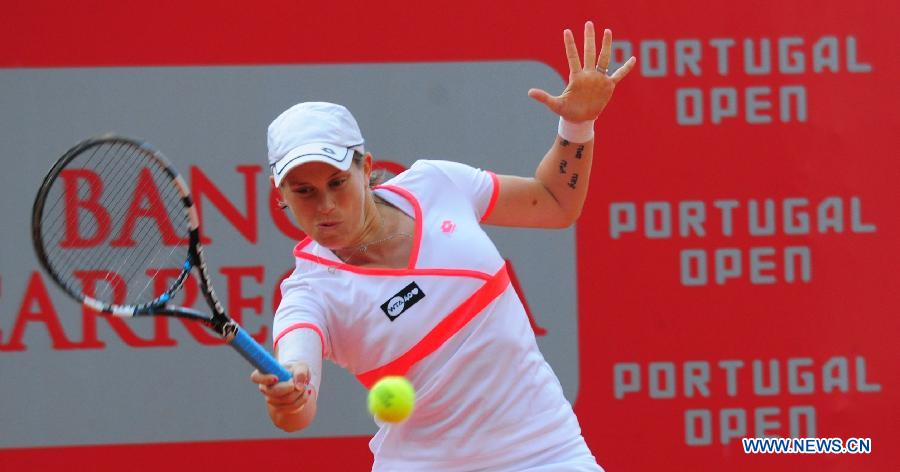 Switzerland's Romina Oprandi returns the ball during a second round match against China's Peng Shuai at the 2013 Portugal Open in Oeiras in the vicinity of capital Lisbon, Portugal, May 1, 2013. Oprandi won the match 2-0. (Xinhua/Zhang Liyun)