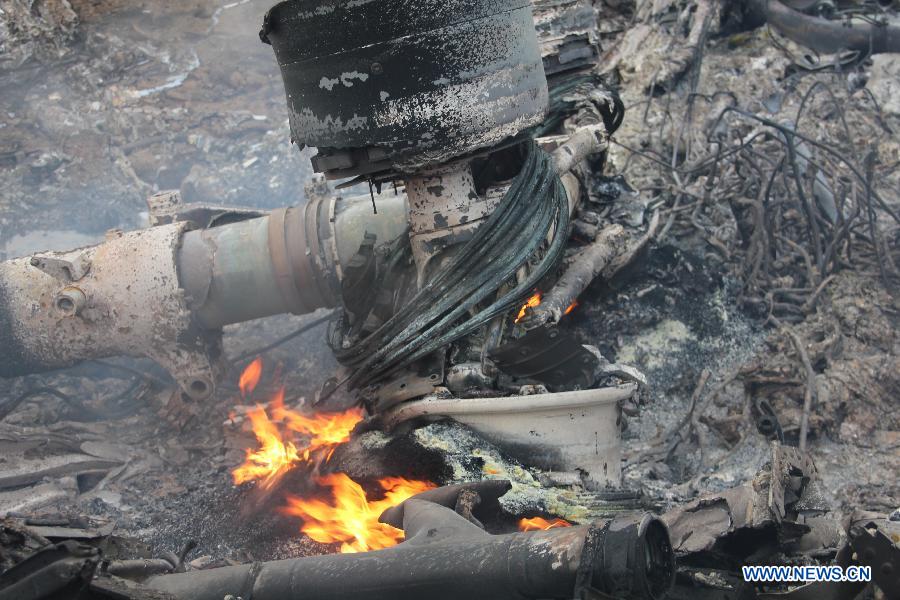 Photo taken on May 3, 2013, shows the scene after a U.S. military plane crashed in Kyrgyzstan. A U.S. military plane crashed Friday in Kyrgyzstan, the country's emergency situations ministry said. There was no immediate word on any casualties but the ministry said preliminary information indicated that there were five people aboard. (Xinhua)