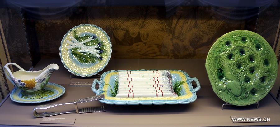 Photo taken on May 4, 2013 shows a set of classic French tableware displayed in an exhibition of "Splendour of the French Table" in Hong Kong, south China. As one of the activities of "French May", the exhibition which will last till June 9 presents tableware from leading French historical manufactures and luxury maisons since the 18th century. (Xinhua/Li Peng) 