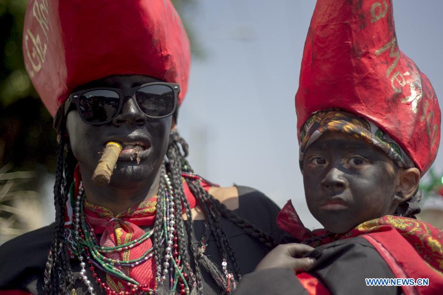 Residents participate in the celebrations of 151st anniversary of the Battle of Puebla, at the Penon de los Banos neighborhood, in Mexico City, capital of Mexico, on May 5, 2013. The Battle of Puebla took place on May 5 1862 near the city of Puebla during the French intervention in Mexico. The Mexican victory is celebrated yearly on May 5. (Xinhua/Alejandro Ayala) 