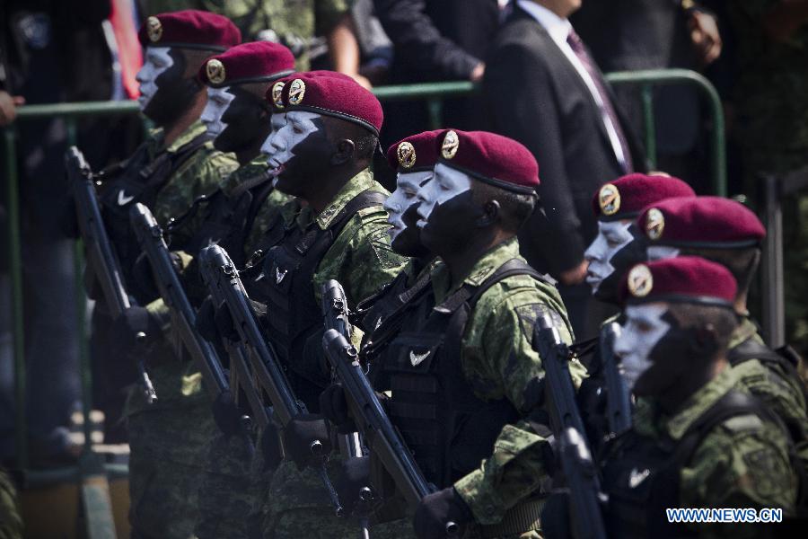 Mexican army soldiers participate in a parade during the celebrations of 151st anniversary of the Battle of Puebla, in the city of Puebla, Mexico, on May 5, 2013. The Battle of Puebla took place on May 5 1862 near the city of Puebla during the French intervention in Mexico. The Mexican victory is celebrated yearly on May 5. (Xinhua/Rodrigo oropeza)