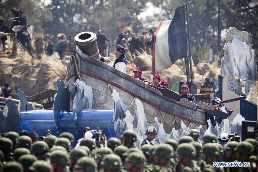 Mexican army soldiers participate in a parade during the celebrations of 151st anniversary of the Battle of Puebla, in the city of Puebla, Mexico, on May 5, 2013. The Battle of Puebla took place on May 5, 1862 near the city of Puebla during the French intervention in Mexico. The Mexican victory is celebrated yearly on May 5. (Xinhua/Rodrigo oropeza)