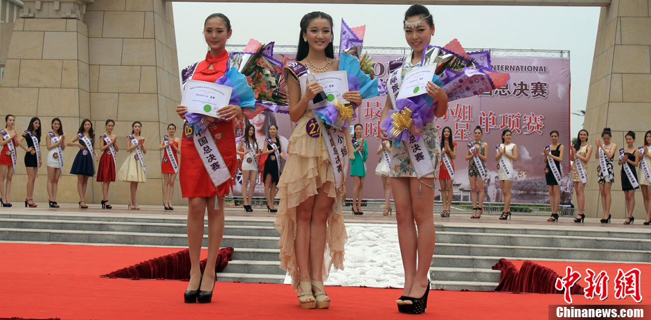 The China Final of 2013 Miss Tourism International rang down the curtain in Huangpi District of Wuhan, capital of central China's Hubei Province, May 5, 2013. (Source: Chinanews.com)