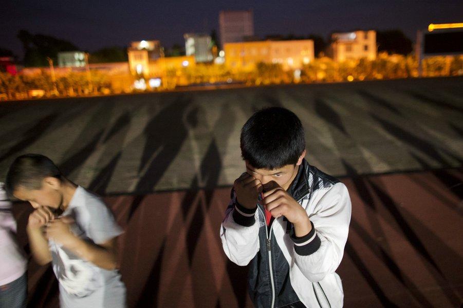 Qi Zhongming, 14, in technical training, April 18, 2013. (Xinhua/Fei Maohua)