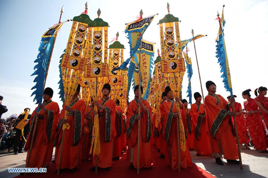 Performers attend a traditional ceremony praying for peace and prosperity during the first Qishan Cultural Festival in the Qishan scenic spot in Linqu County, east China's Shandong Province, May 7, 2013. (Xinhua/Sun Shubao) 