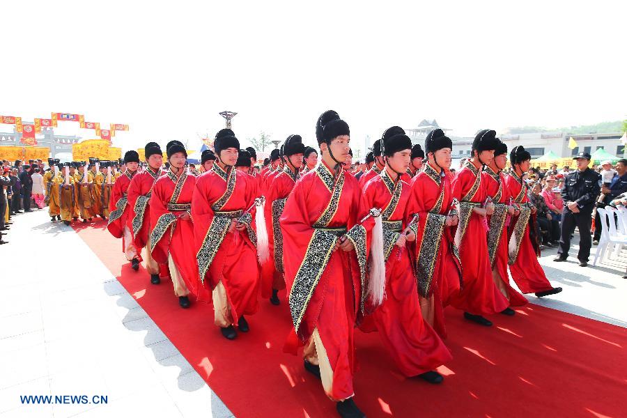 Performers attend a traditional ceremony praying for peace and prosperity during the first Qishan Cultural Festival in the Qishan scenic spot in Linqu County, east China's Shandong Province, May 7, 2013. (Xinhua/Sun Shubao) 