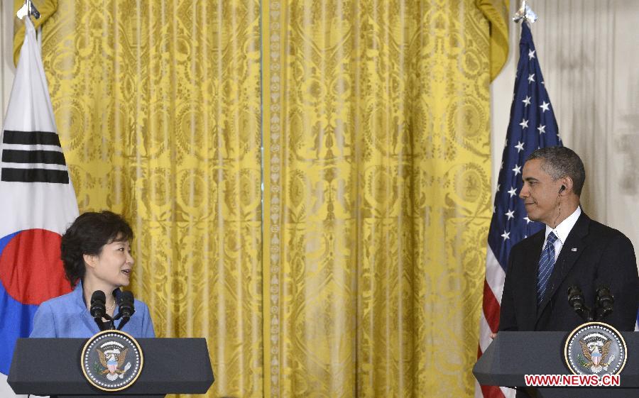 U.S. President Barack Obama (R) and visiting South Korean President Park Geun-hye attend a joint press conferece after their meetings in the East Room of the White House in Washington D.C., capital of the United States, May 7, 2013. (Xinhua/Zhang Jun) 