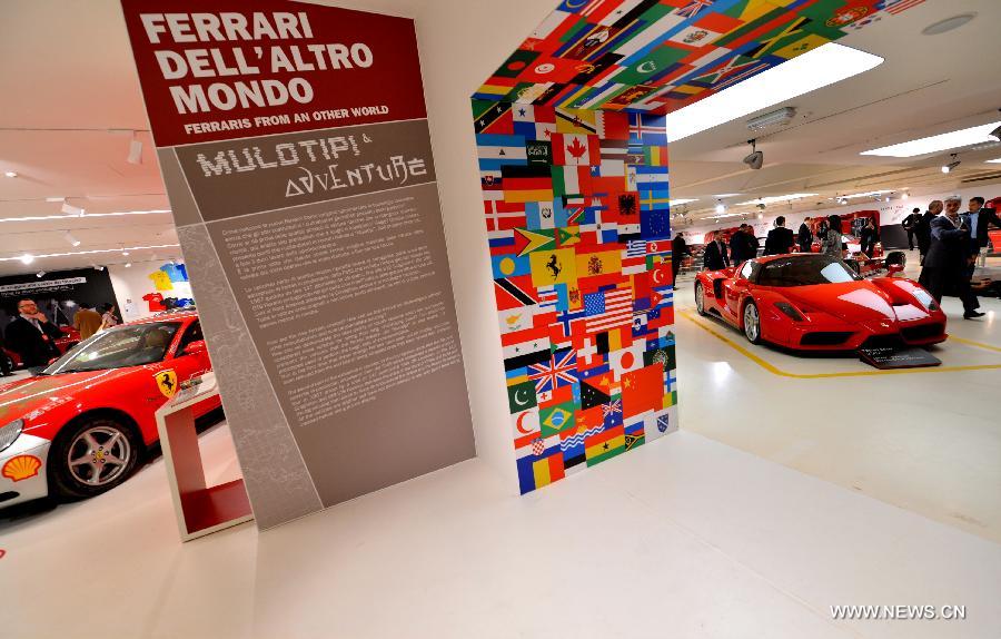 Visitors tour the Ferrari Museum in Maranello, north Italy, May 7, 2013. The Ferrari Museum in Maranello is the only official museum directly run by Ferrari, offering visitors an authentic Ferrari experience with virtual driving and the company's history. (Xinhua/Xu Nizhi) 