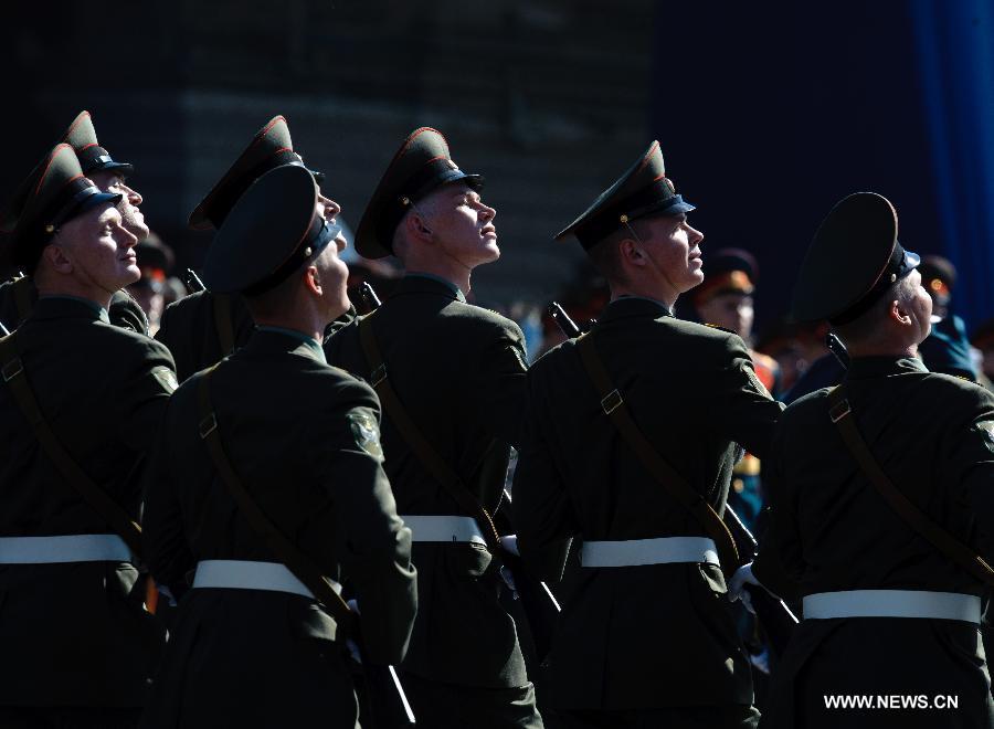 Soldiers take part in a Victory Day parade at the Red Square in Moscow, on May 9, 2013. A grand parade was held on Thursday at Red Square to mark the 68th anniversary of the Soviet victory over Nazi Germany in the Great Patriotic War. (Xinhua/Jiang Kehong) 