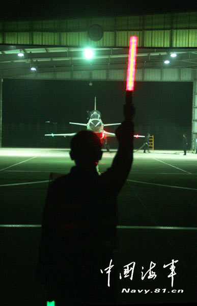 Recently, a flight regiment under the Navy of the Chinese People's Liberation Army (PLAN) organized its new-type fighters to carry out night flight training. (Chinamil.com.cn/Cai Bo)