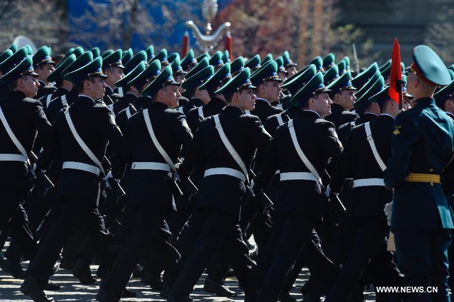 Soldiers take part in a Victory Day parade at the Red Square in Moscow, on May 9, 2013. A grand parade was held on Thursday at Red Square to mark the 68th anniversary of the Soviet victory over Nazi Germany in the Great Patriotic War. (Xinhua/Jiang Kehong)