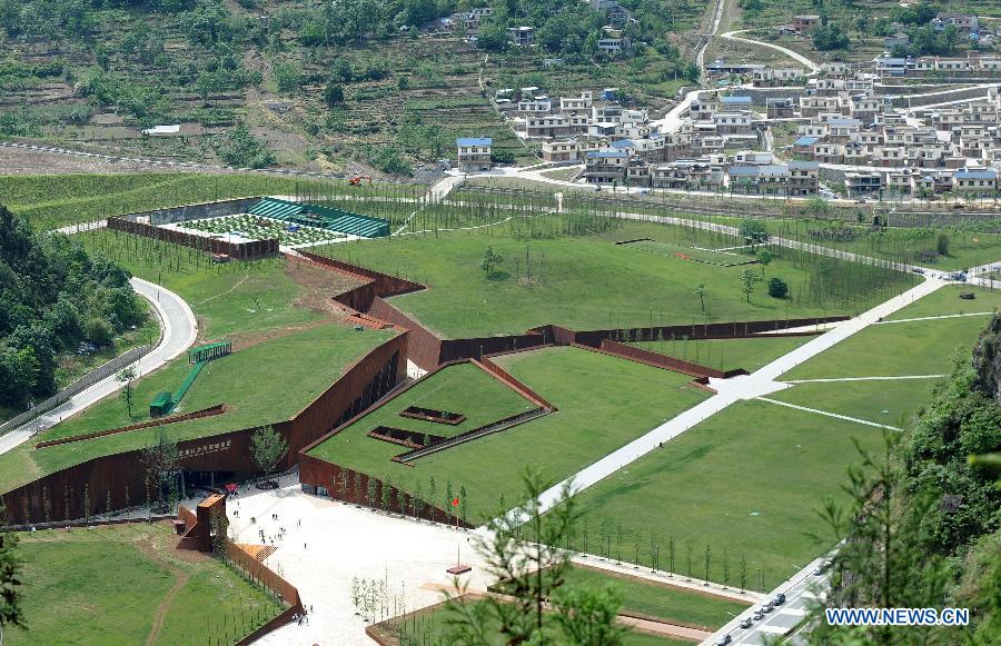Photo taken on May 9, 2013 shows the crack-shaped Wenchuan Earthquake Memorial Museum in the town of Qushan, Beichuan Qiang Autonomous County, southwest China's Sichuan Province, May 9, 2013. The museum was officially opened to the public for free on Thursday to commemorate the fifth anniversary of the Wenchuan earthquake, which hit Sichuan on May 12, 2008 and left more than 87,000 people dead or missing. (Xinhua/Xue Yubin) 