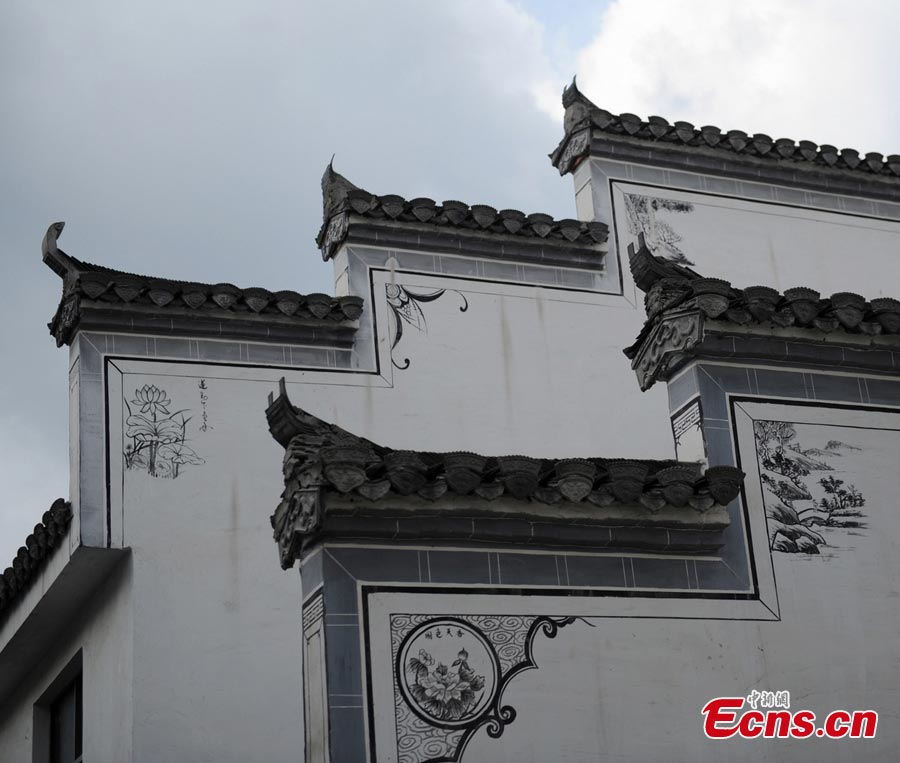 Photo shows grey-tiled and white-walled houses featuring Hui-style architecture in Baimaguan County, Luojiang, Sichuan Province. Many of those houses were damaged during the Wenchuan earthquake on May 12, 2008. But they have been restored five years later, which transformed the county into a tourist attraction. Baimaguan used to be a famous battlefield during the Three Kingdoms period (220 AD-280AD). (CNS/Liu Zhongjun)