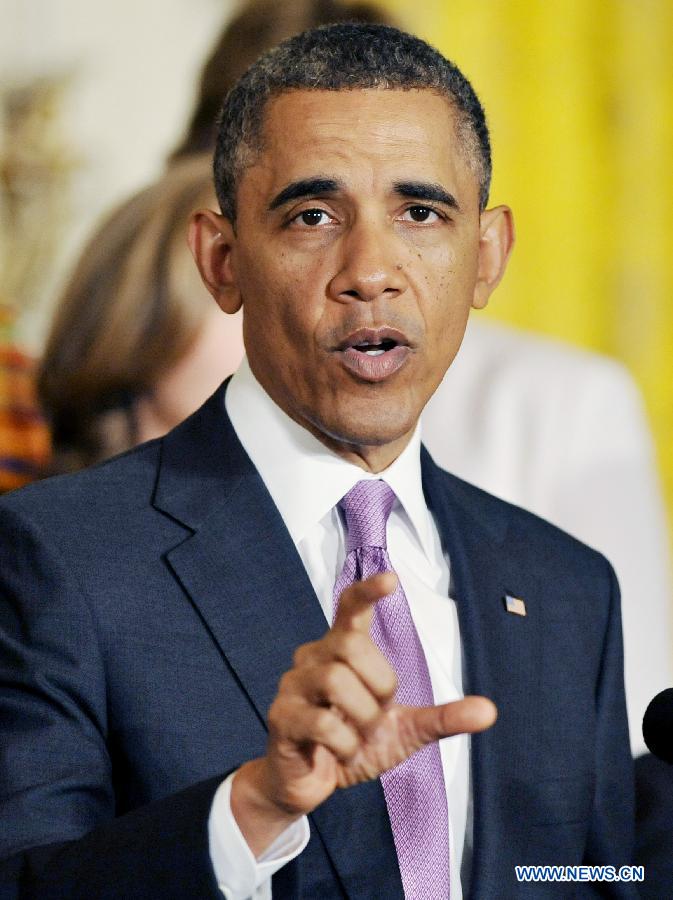 U.S. President Obama speaks on the impact of the Affordable Care Act on the health, lives and pocketbooks of women and their families at the White House in Washington D.C. May 10, 2013. (Xinhua/Fang Zhe) 