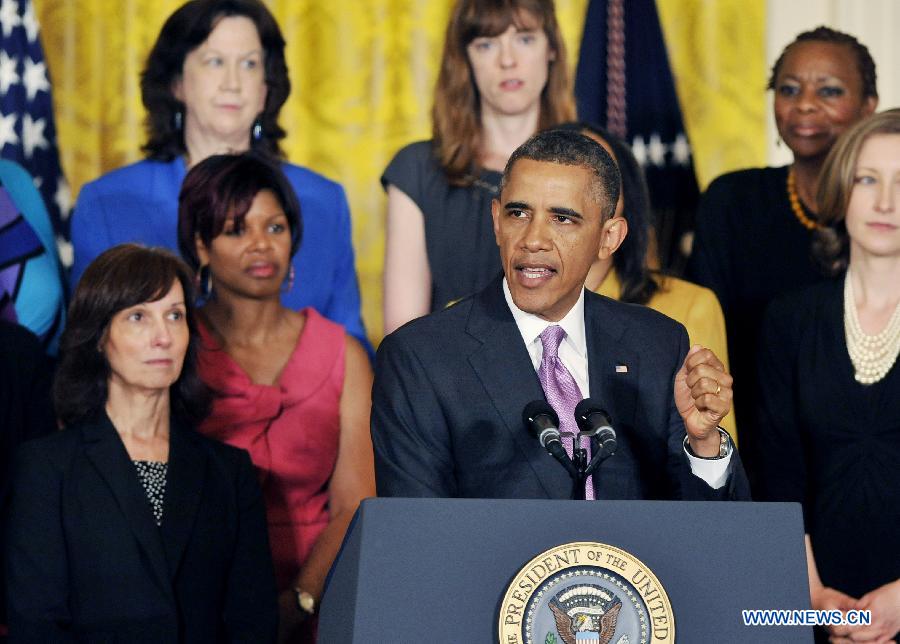 U.S. President Obama speaks on the impact of the Affordable Care Act on the health, lives and pocketbooks of women and their families at the White House in Washington D.C. May 10, 2013. (Xinhua/Fang Zhe) 