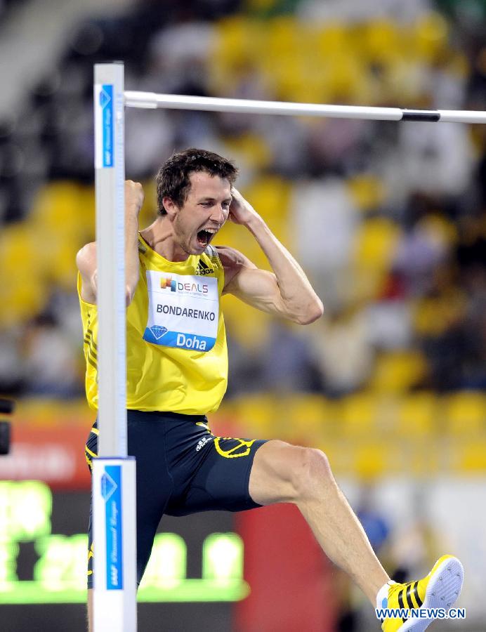 Ukraine's Bohdan Bondarenko celebrates during the men's high jump final at the IAAF Diamond League in Doha, capital of Qatar, May 10, 2013. Bondarenko claimed the title of the event with 2.33 metres. (Xinhua/Chen Shaojin)