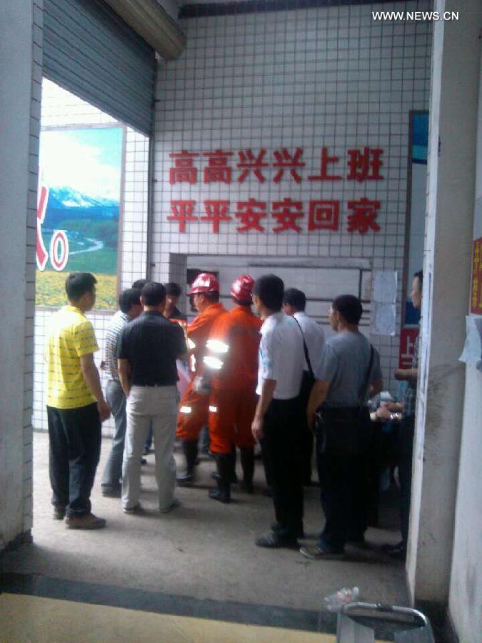 Rescuers prepare to conduct rescue work at the site of a gas accident in a colliery in Luzhou, southwest China's Sichuan Province, May 11, 2013. The accident occurred around 2 p.m. in Taozigou coal mine, Luxian County in the city of Luzhou when 108 miners were working underground. By 7:30 p.m., one has died and 37 still trapped underground. (Xinhua) 